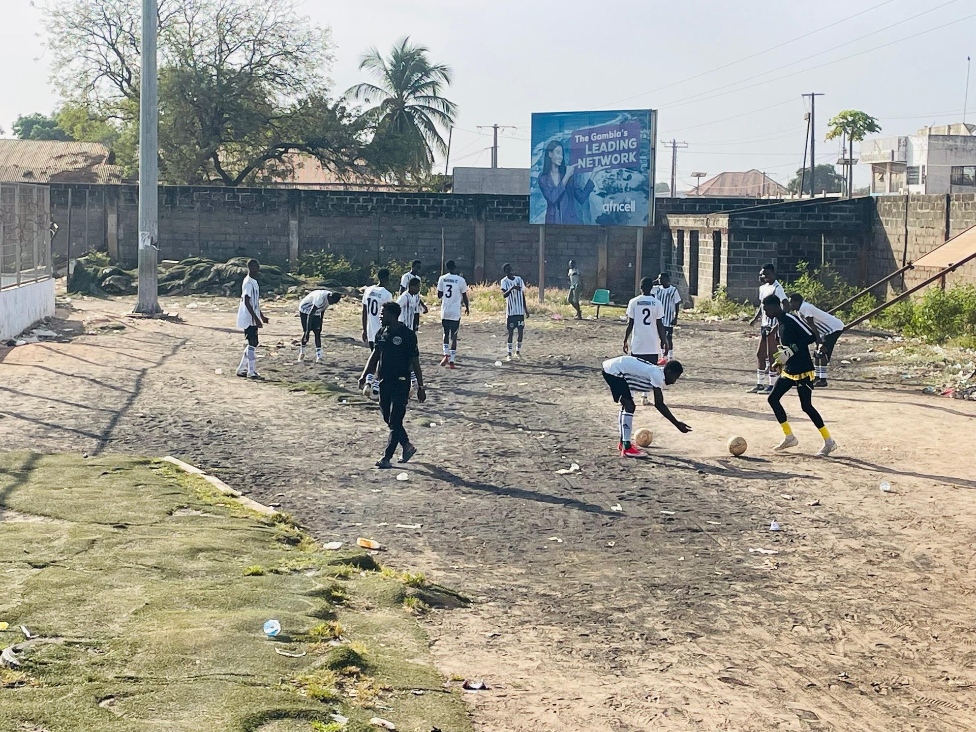 Team practice on dirt field