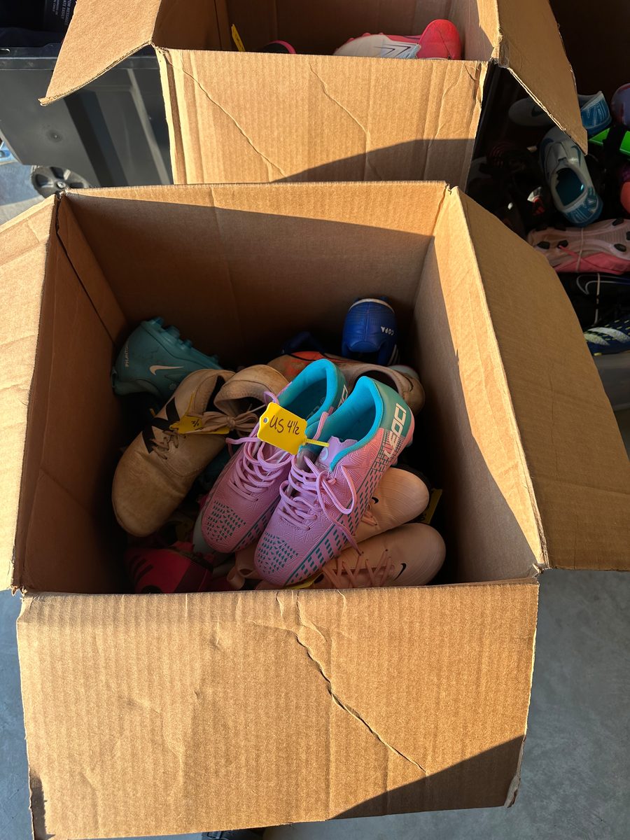 Donated soccer balls being transported