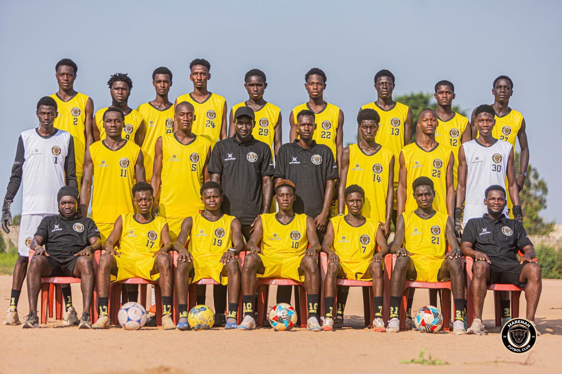 Marenah FC team in yellow kit